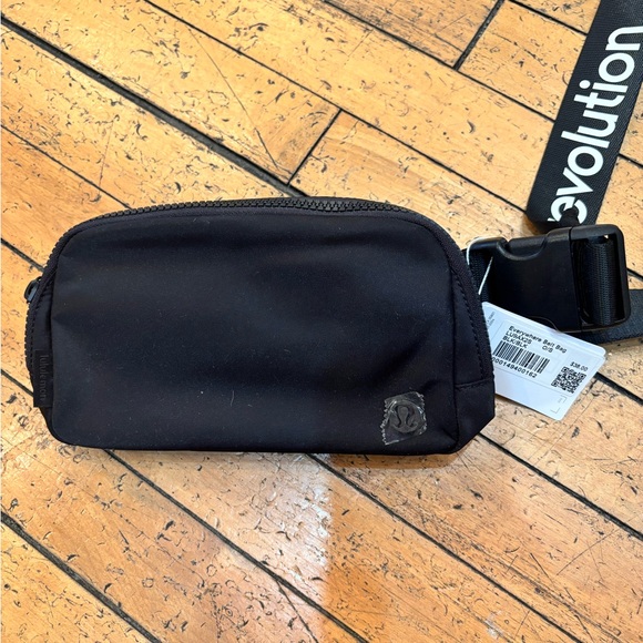 lululemon athletica Handbags - Lululemon Everywhere Belt bag, 1L - NWT with Revolution print